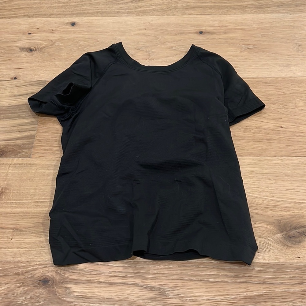 Black lululemon swiftly tech shirt. Size 4. *race length*